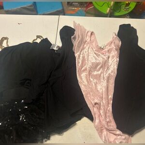 Source Unknown Black and Pink Kids Dance Costumes